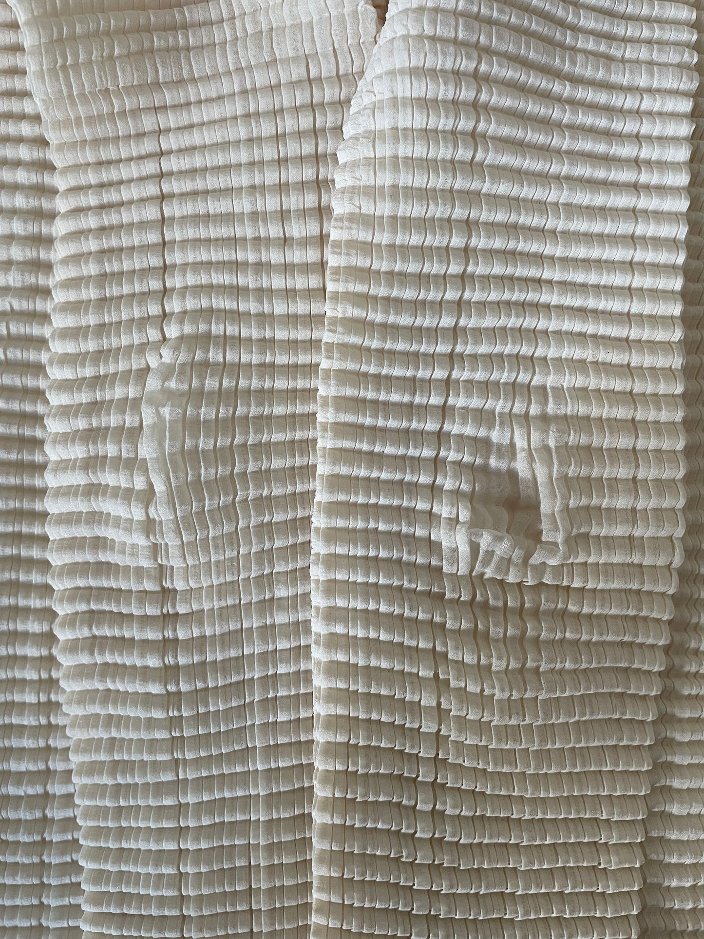 Issey Miyake Pleats T cream waffle pleated long sleeve turtleneck