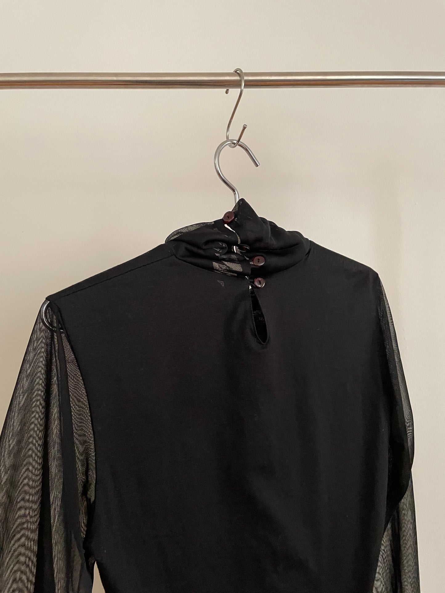 Yohji Yamamoto black turtleneck with sheer neck and sleeves