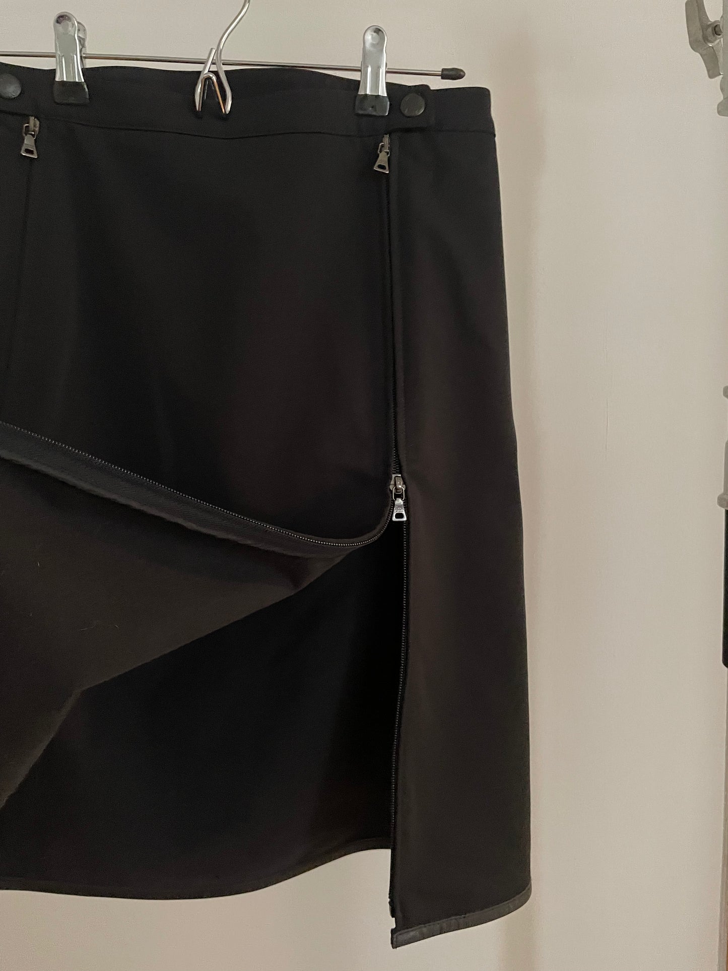 Detail view of vintage womens Prada Sport black skirt with zippers