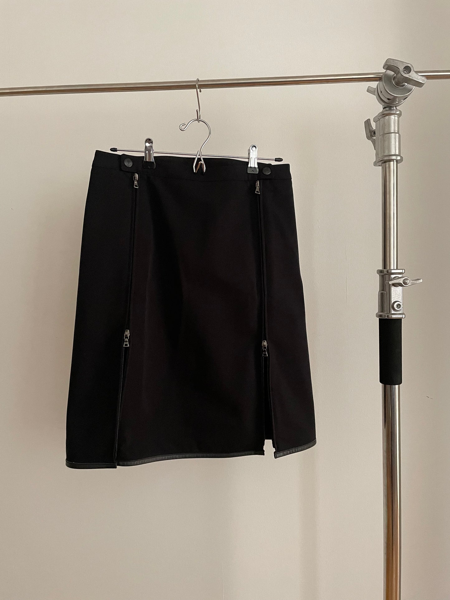 Front view of vintage womens Prada Sport black skirt with zippers