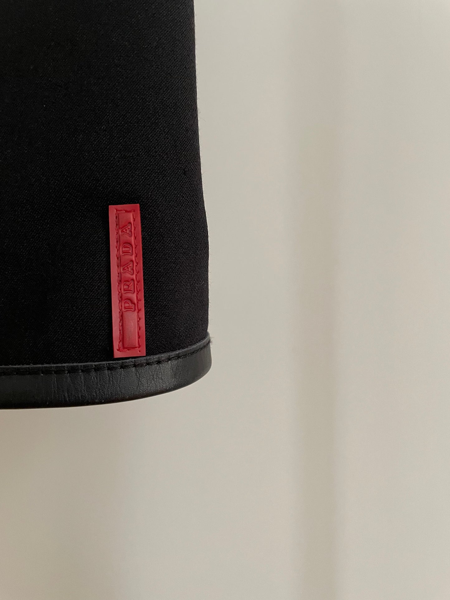 Detail view of vintage womens Prada Sport black skirt with zippers