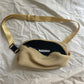 Pleats Please Issey Miyake yellow pleated crossbody bag