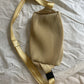 Pleats Please Issey Miyake yellow pleated crossbody bag
