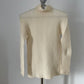 Issey Miyake Pleats T cream waffle pleated long sleeve turtleneck