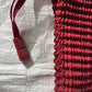 Issey Miyake red drawstring bag
