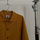 Detail view of vintage womens HAI Sporting Gear mustard yellow chore coat