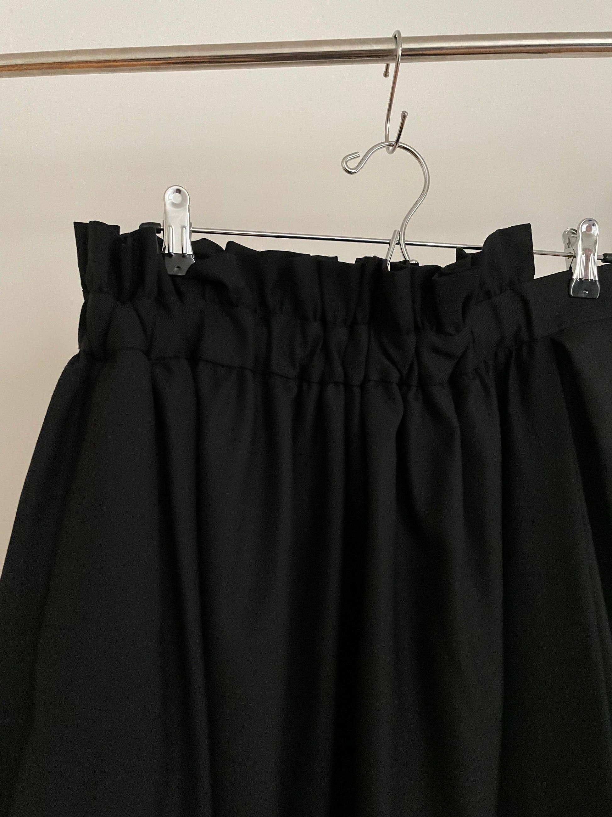 Vintage womens Noir Kei Ninomiya voluminous multi-paneled black asymmetrical pleated skirt 
