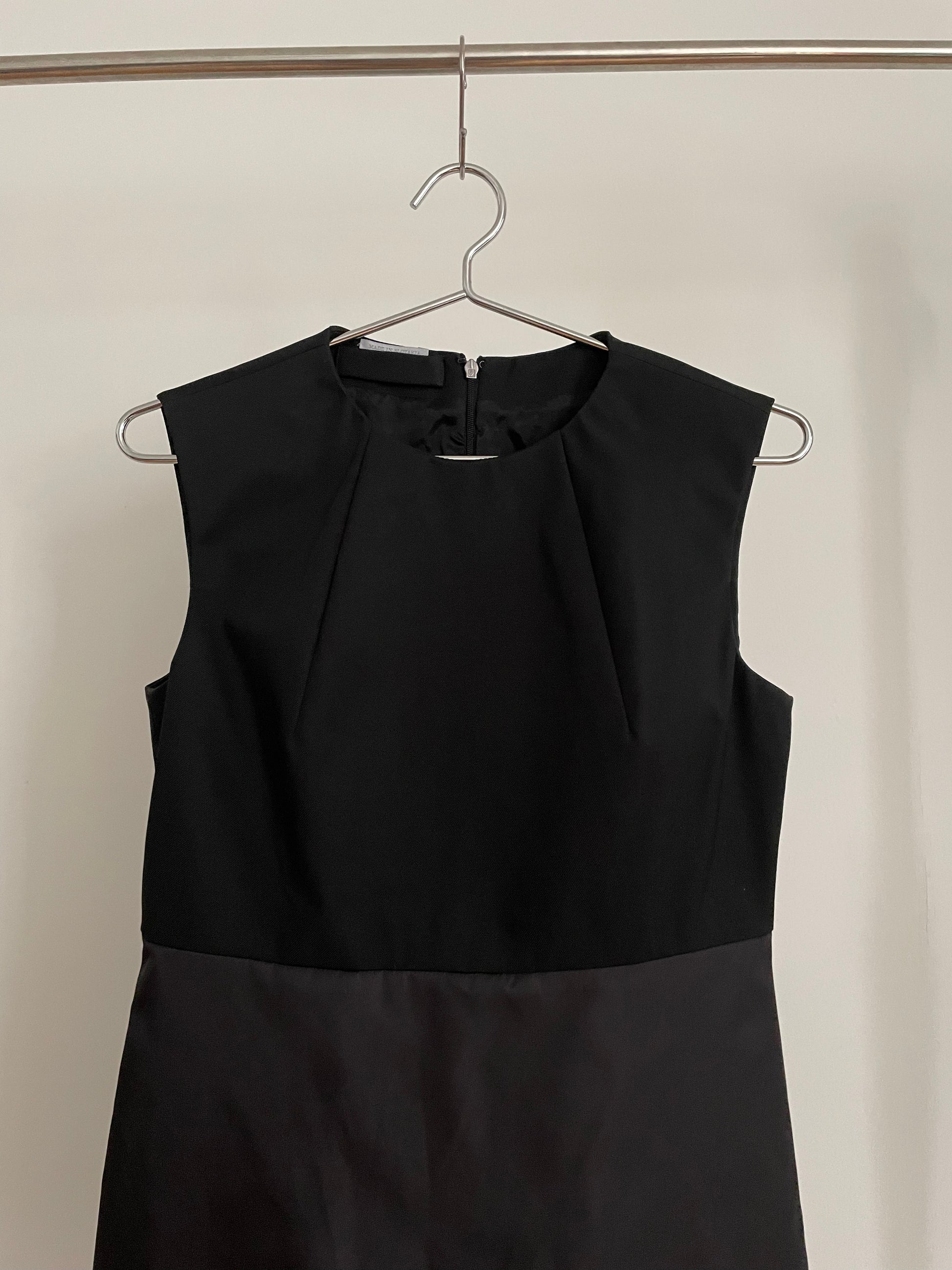 Detail view of womens vintage black Prada dress