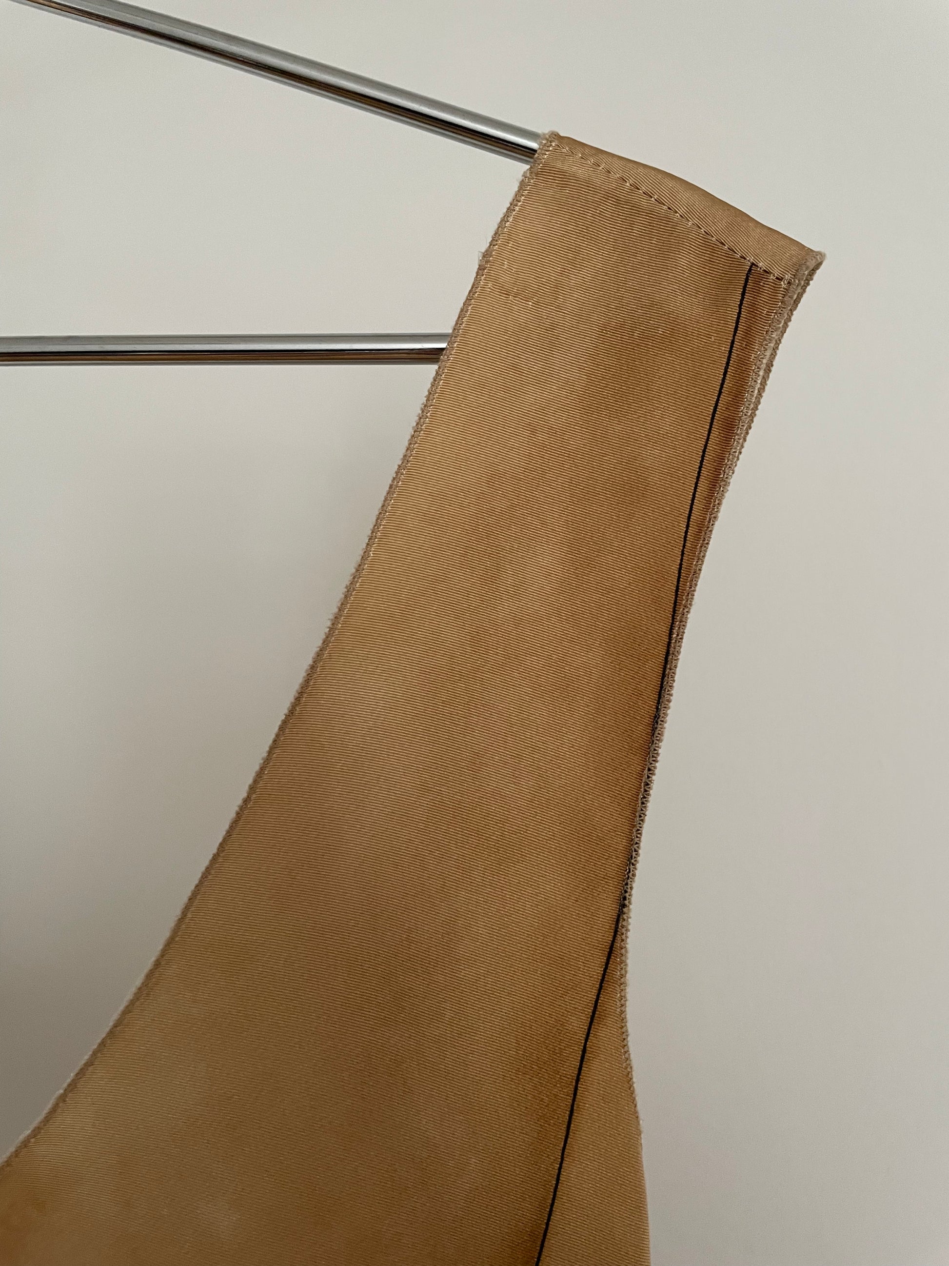 Detail view of archival runway Prada spring/summer 2006 beige and brown dress