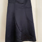 Detail view of vintage womens Comme des Garçons black midi dress with geometric panels
