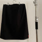 Back view of vintage womens Prada Sport black skirt with zippers