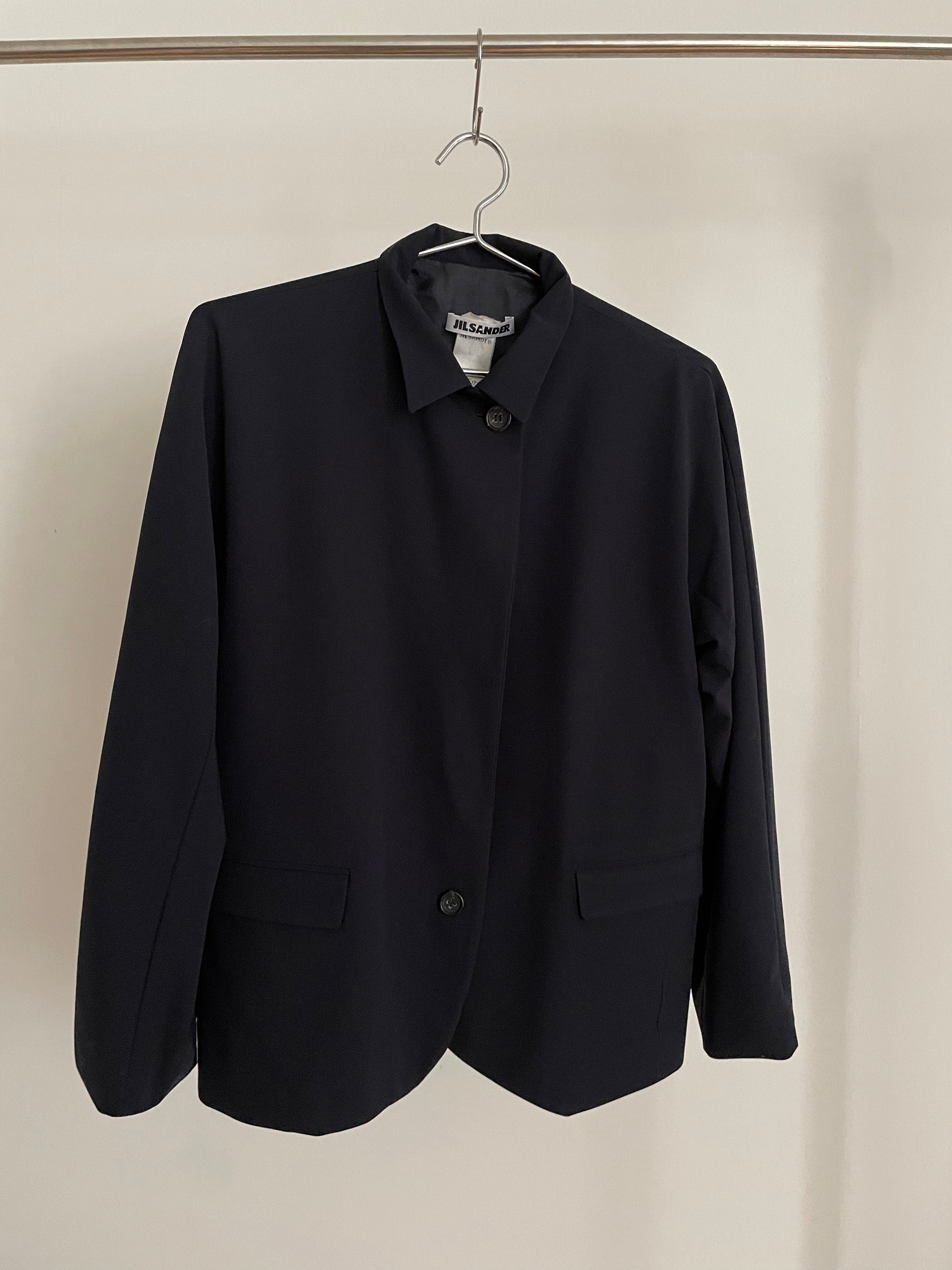 Front view of vintage womens Jil Sander two-button navy blazer