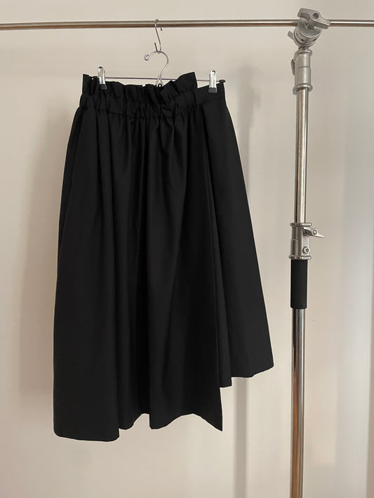 Vintage womens Noir Kei Ninomiya voluminous multi-paneled black asymmetrical pleated skirt 