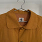 Detail view of vintage womens HAI Sporting Gear mustard yellow chore coat