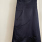 Detail view of vintage womens Comme des Garçons black midi dress with geometric panels