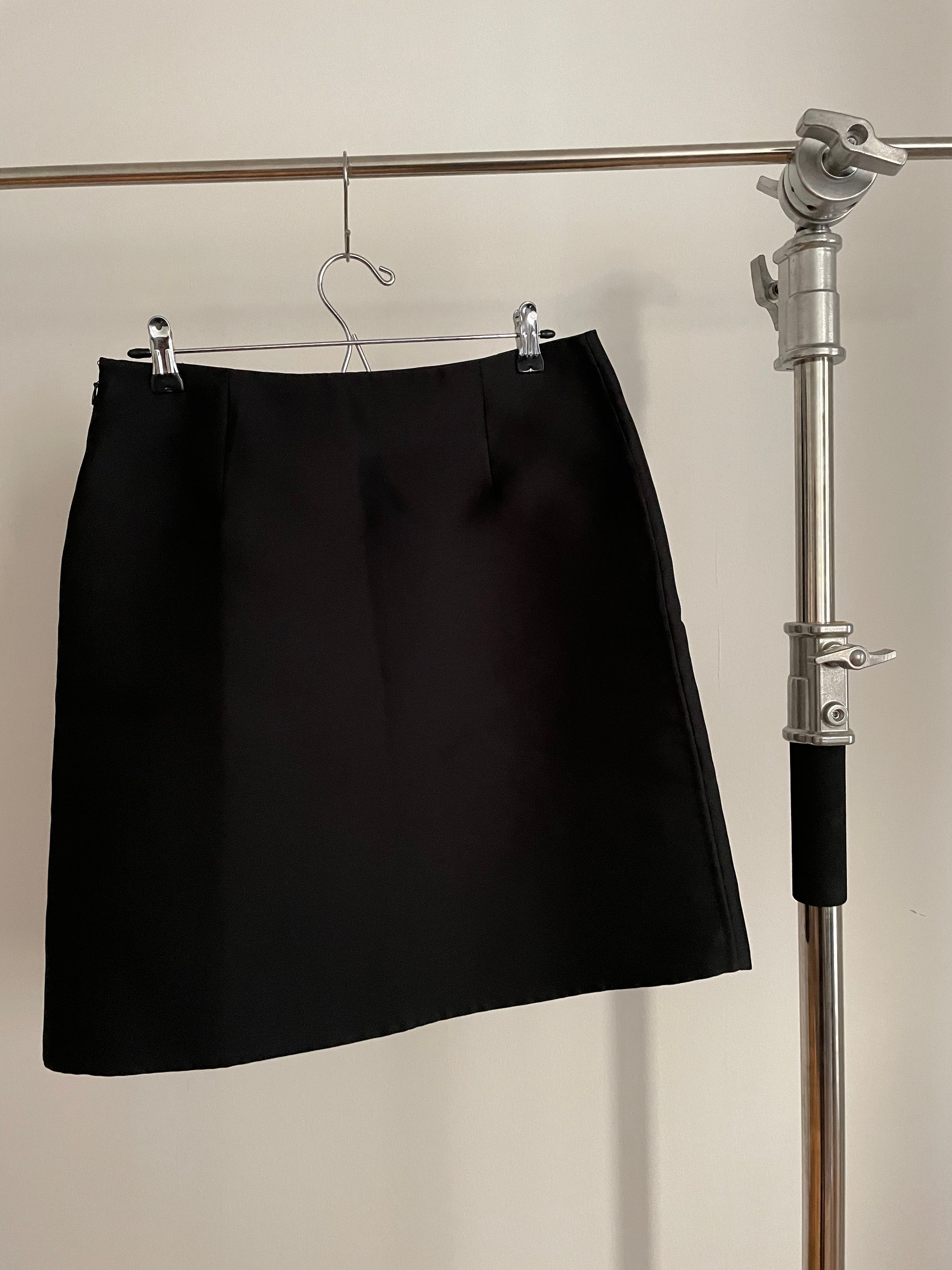 Back view of vintage womens Prada spring/summer 2013 skirt with floral appliqués