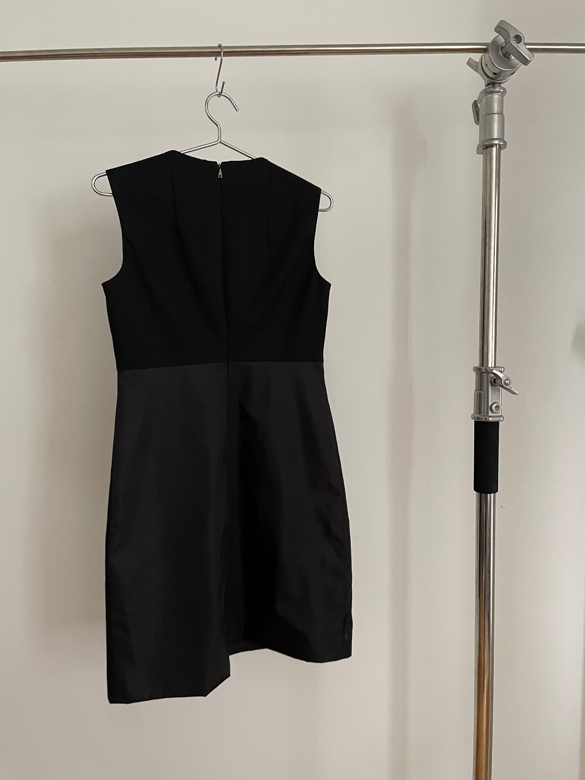 Back view of womens vintage black Prada dress