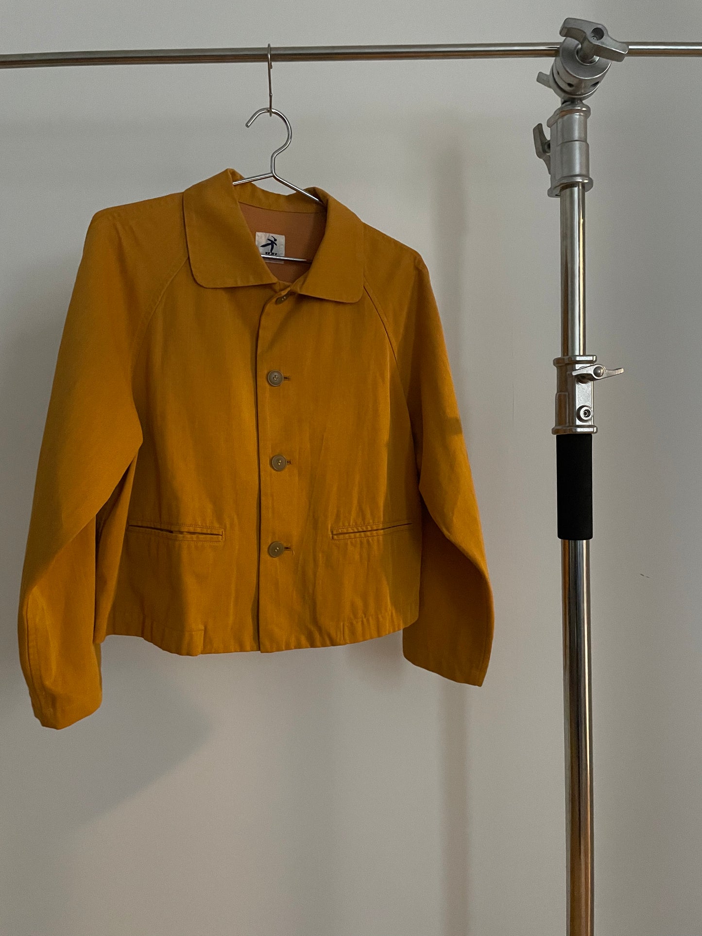 Front view of vintage womens HAI Sporting Gear mustard yellow chore coat