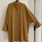 Front view of vintage womens Jil Sander 1980s camel dolman sleeve coat