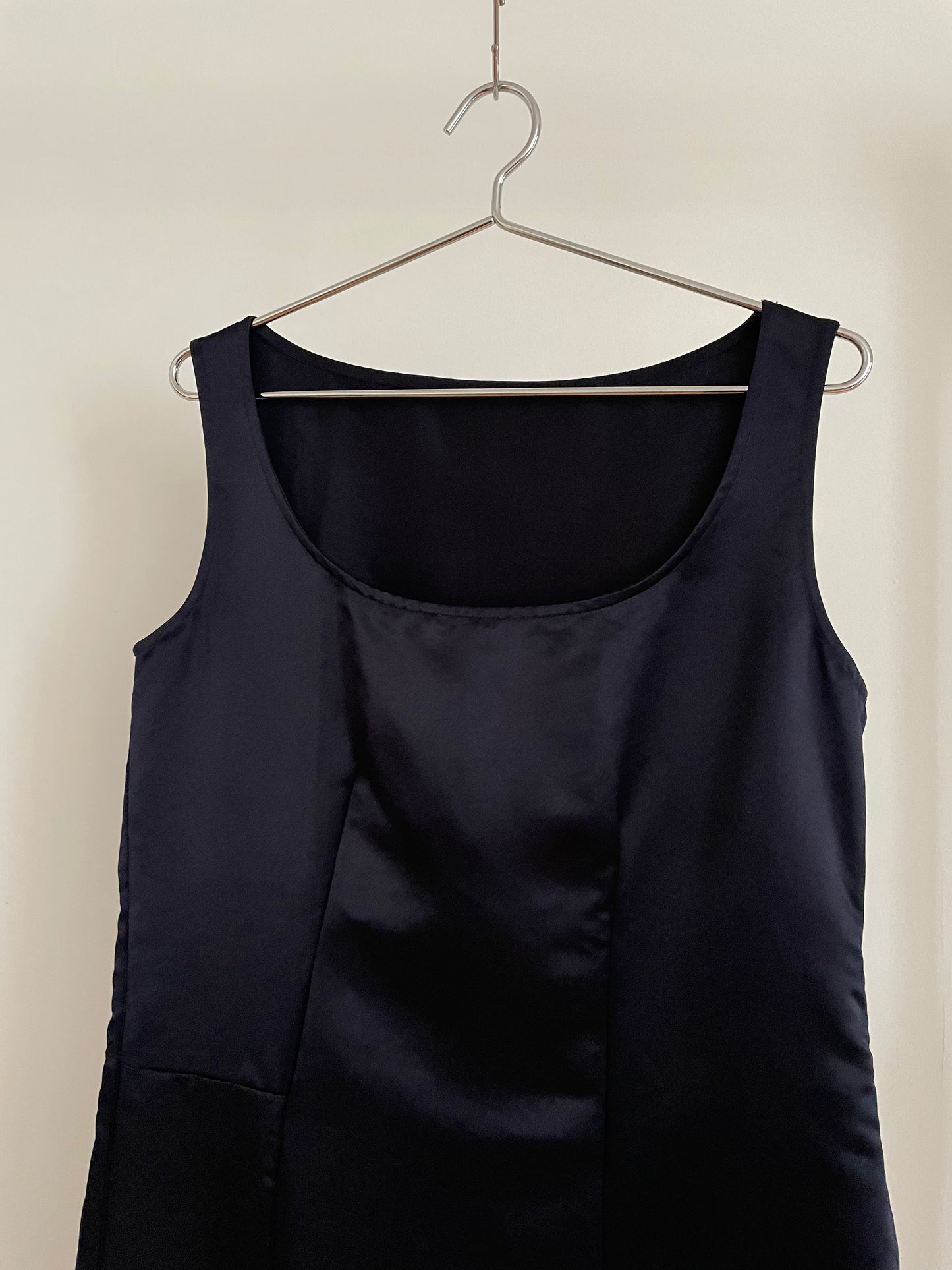 Detail view of vintage womens Comme des Garçons black midi dress with geometric panels